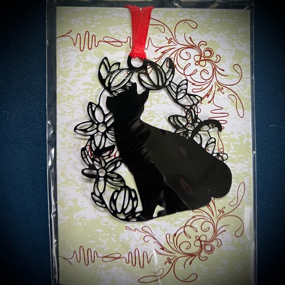 Black cat with flowers metal ornament or bookmark with red ribbon